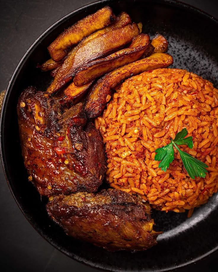 A GrubNmore jollof rice, chicken, and fried plantain plate, ready for delivery